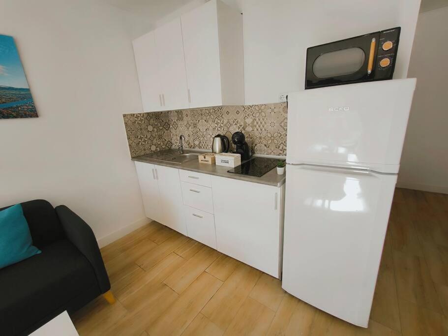Yinfa 2 Sunset Apartment Тамаймо Экстерьер фото